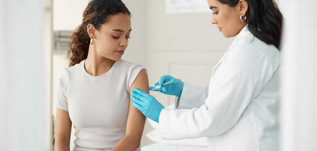 Healthcare professional giving Vitamin B12 injections in Saraland AL to a patient for energy and wellness support