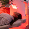 Woman experiencing the best red light therapy in Saraland AL for whole-body wellness