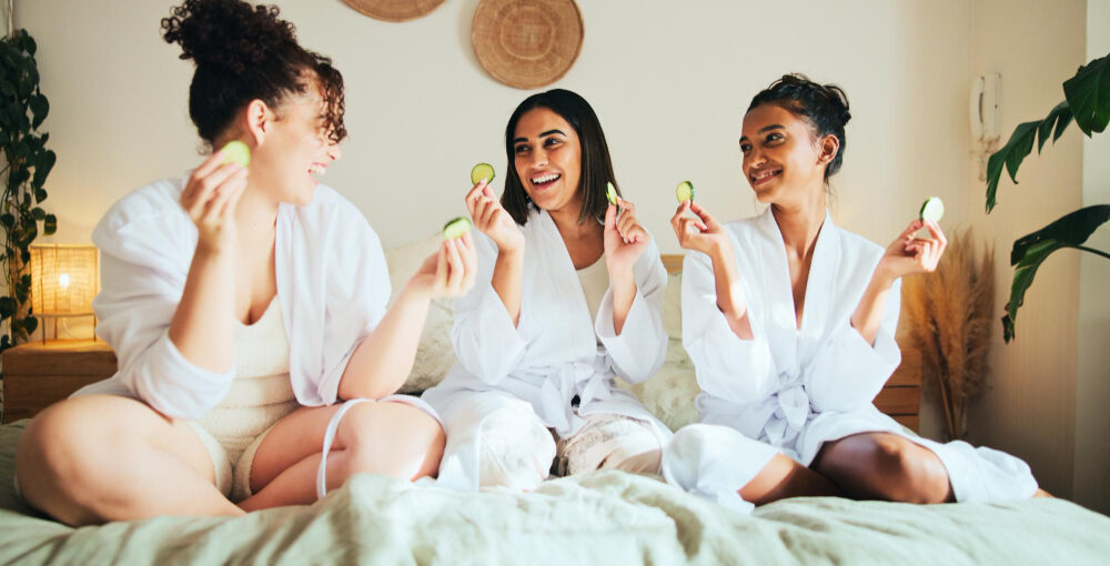 Women enjoying a relaxing spa moment together during a holiday wellness party in Saraland AL