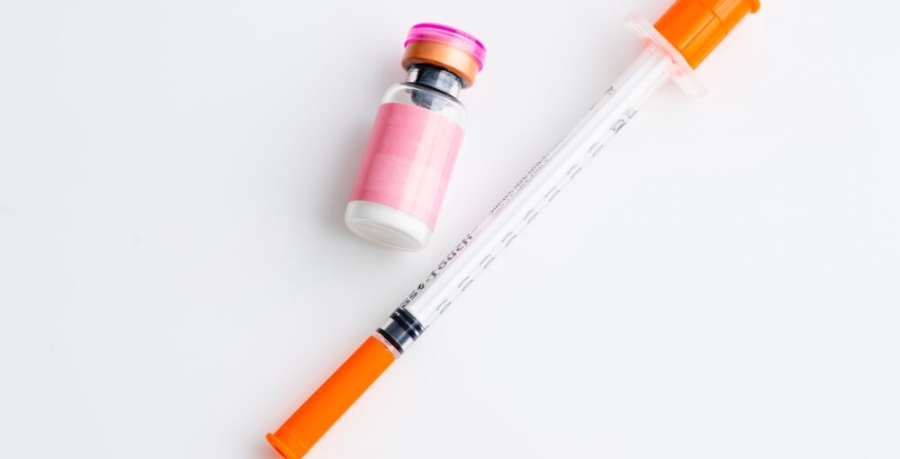 Provider consulting with a patient about peptide therapy for energy and sexual performance at Drip Lounge and Wellness in Saraland AL